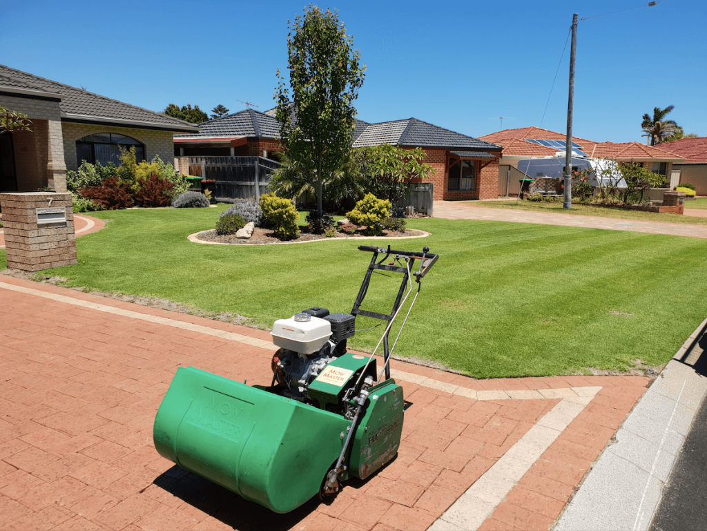 Lawn mower near green lawn Kwinana Lawns